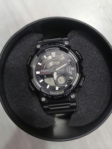 willande saat: Casio kişi qol saatı – analoq + rəqəmsal hibrid model Xüsusiyyətlər — 1