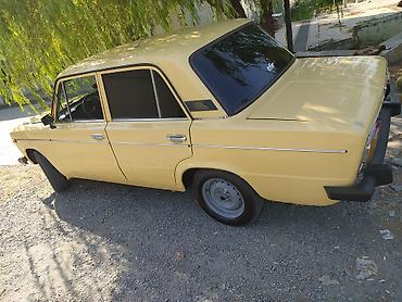 vaz 2106 şit: VAZ 2106, sarı rəng, sedan kuzov. Xüsusiyyətlər: - Arxa ötürücülü — 3