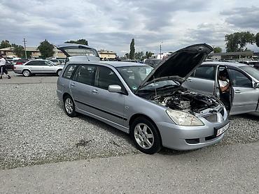 Mitsubishi: Mitsubishi Lancer: 2003 г., 1.6 л, Механика, Бензин, Универсал — 11