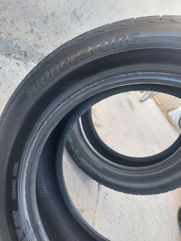 tek oturacaqlar: İşlənmiş Şin Bridgestone 215 / 55 / R 17