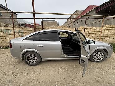 opel sukanı: Opel Vectra C sedan, gümüşü rəng. - Kuzov: 4 qapılı sedan — 2