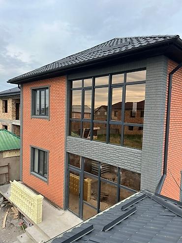 Фиброцементные фасадные панели: Двухэтажный дом с комбинированной отделкой фасада: одна часть — 2