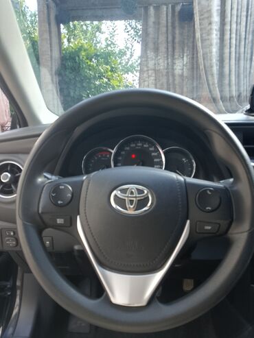 покрышка на мтз: Представляем Toyota Corolla в черном цвете, оснащенную четырьмя