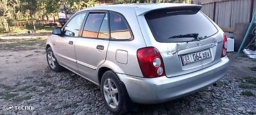 возможен в обмен: Mazda 323: 2002 г., 1.3 л, Механика, Лифтбек — 3