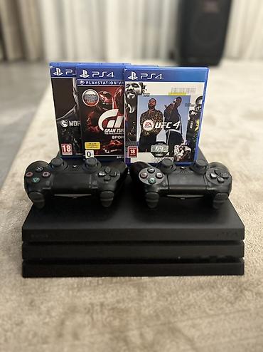 PlayStation 4 Pro (PS4 Pro) + 2 геймпада DualShock 4 + 3 диска Состав