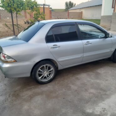 Mitsubishi: Mitsubishi Lancer: 2005 г., 1.6 л, Механика, Бензин
