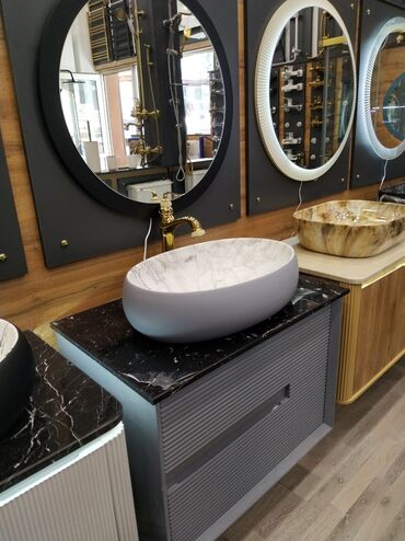Haima: Oval formada, mərmər effekti ilə dizayn edilmiş bu lavabo, boz rəngli