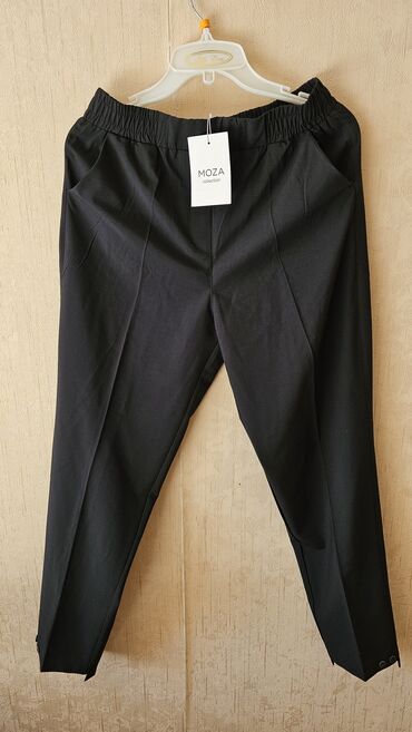 женские клеш брюки: Черные женские брюки от MOZA Collection. Эти брюки с эластичной талией