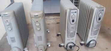 traktor altlıqlı qara qadın bosonojkaları: Yağ radiatorları (elektrikli isidici) Əldə 4 ədəd var.Üçünün heç bur