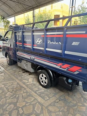 ресор на портер: Hyundai Porter II — компактный грузовик (бортовой) синего цвета — 4