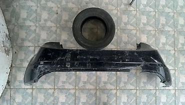 Udarniklər, bufer şvelleri: Avtomobil üçün arxa bufer. Qara rəngdə arxa bamperdir. Şəkillərdə — 1