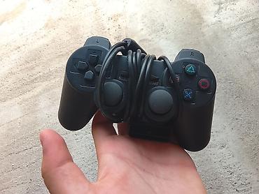 аренда playstation 4: Sony PlayStation 2 Slim (PS2 Slim) oyun konsolu - Model: SCPH-7xxxx — 5