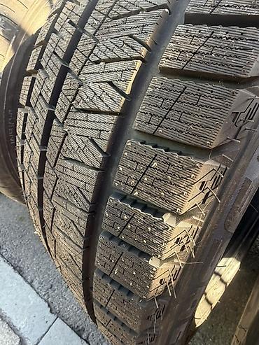 Шины: Комплект зимних шин 235/50 R18. Новые На фото — 4 автомобильные шины — 2