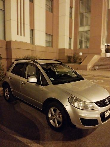 suzuki moto: Suzuki SX4 – gümüşü rəngli, şəhər və rayon yolları üçün praktik — 3