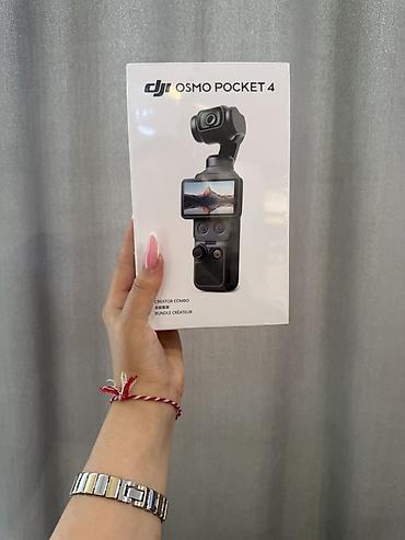 osmo pocket 3 creator combo: DJI Osmo Pocket 4 – Creator Combo - Cib ölçülü 3-oxlu stabilizasiya — 1