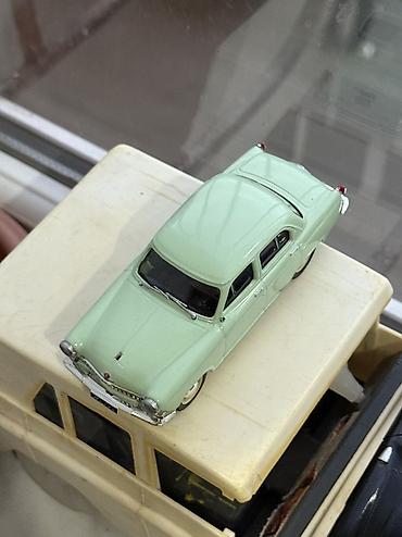 model 1: Deagostini firmasina mexsus olan qaz 21 modeli 1:43 olcu vezyeti — 4