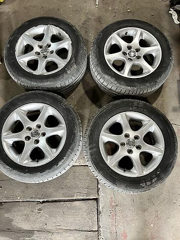 16 lt: Комплект из 4 легкосплавных дисков с шинами. 215/60r16 Разболтовка — 1