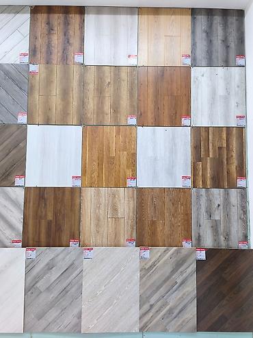 Məhsul: Laminat döşəmə panelləri (geniş rəng və tekstura seçimi)