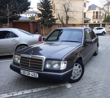 maşınlar mersedes: Mercedes-Benz E 200: 2 l | 1991 il Sedan
