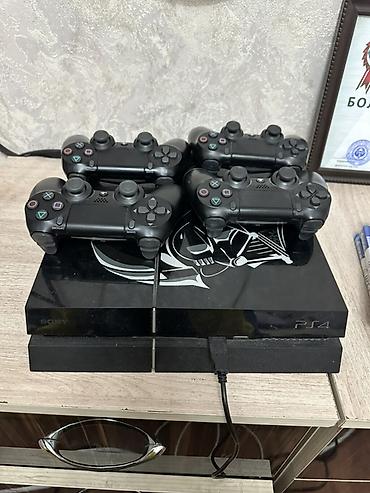 PS4 (Sony PlayStation 4): Игровая консоль Sony PlayStation 4 с комплектом аксессуаров и игр — 1
