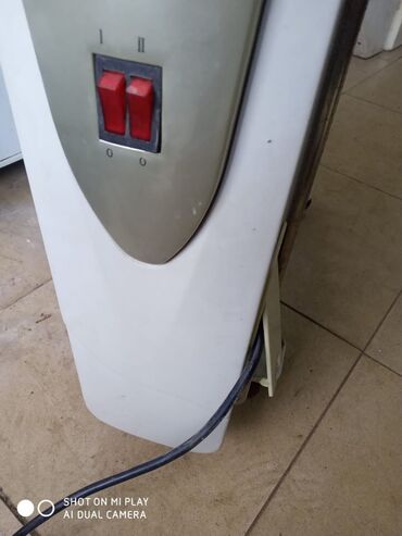 Elektrikli qızdırıcılar və radiatorlar: Yağ radiatoru