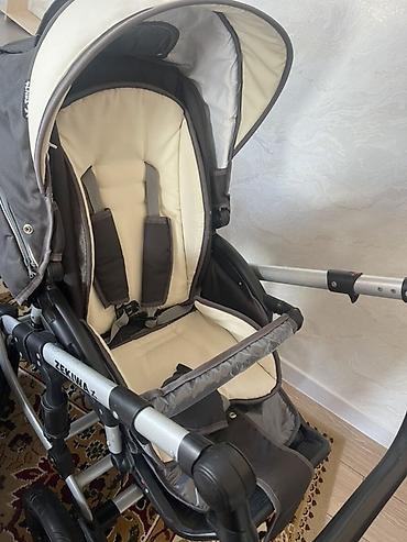 Коляски: Детская коляска Zekiwa (универсальная 2-в-1). Комплектация: - Люлька — 5