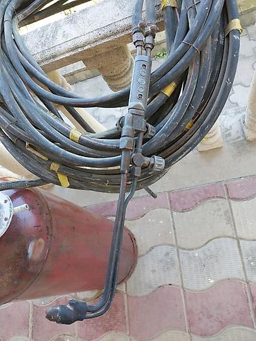 qaz klapanı: Sənaye qaz kəsici komplekti Tərkib: - Metal balon (qaz üçün), üst — 2
