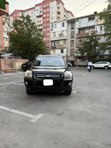 Kia Sportage: 1.4 л | Внедорожник