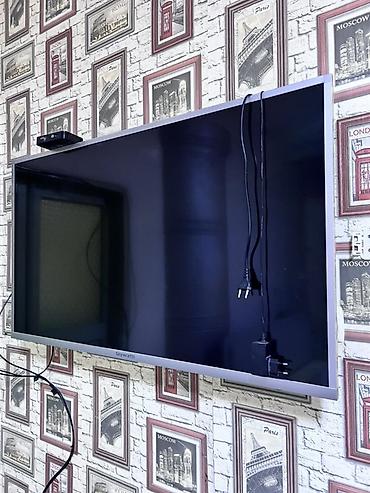 skyworth 43e55g: Телевизор Skyworth, диагональ около 40–43". Плоская LED‑панель, тонкая — 2