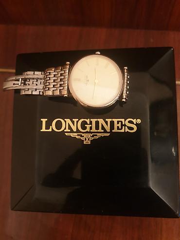 Qol saatları: Işlənmiş qızılı rəngdə vaxtı ilə 2000 evroya alınıb ) Longines — 3