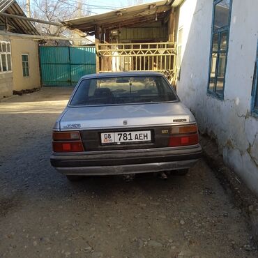 Mazda: Mazda 2: 1987 г., 2 л, Механика, Газ, Седан — 4