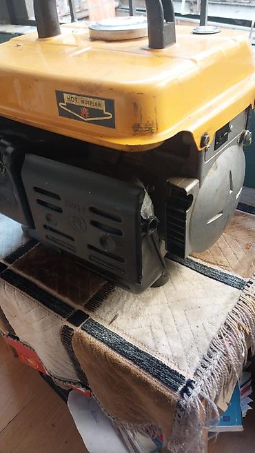 Benzinlə işləyən generator. Bir yaylaq sezonu işləyib. Sonra porşen