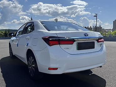 электромобиль дешевый: Toyota Corolla: 2021 г., 1.8 л, Автомат, Гибрид, Седан — 4