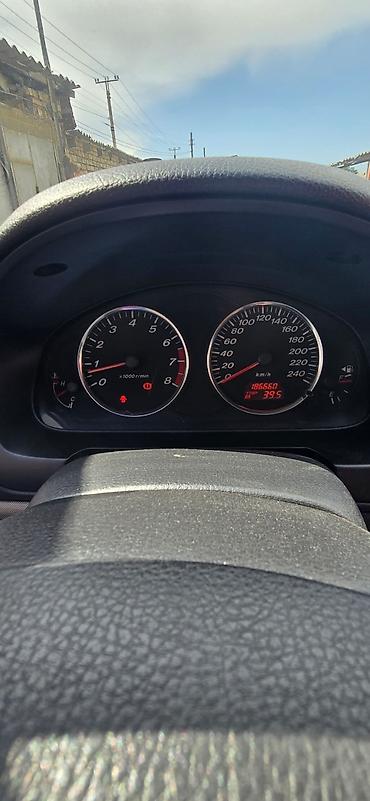 cx 9: Mazda 6: 2002 г., 2.3 л, Механика, Бензин, Лифтбек — 10