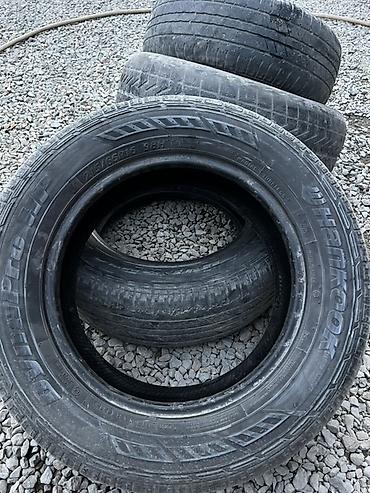 e34 4 4: Комплект автомобильных шин 215/65 R16 98H. Детали: - Типоразмер — 4