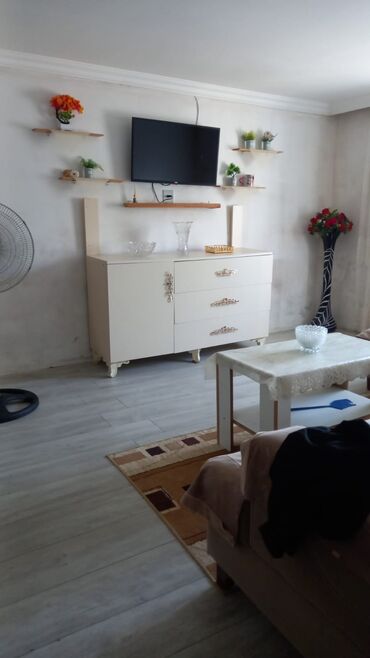 Çəngəllər: TV altlığı