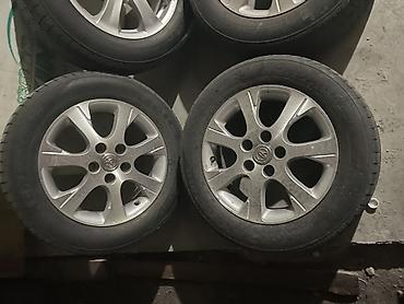 5 110: Комплект из 4 штатных литых дисков Toyota с шинами. Характеристики: - — 2