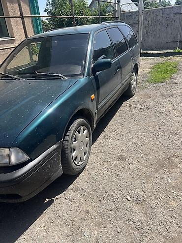 червяк 124: Nissan Primera: 1996 г., 1.6 л, Механика, Бензин, Универсал — 3