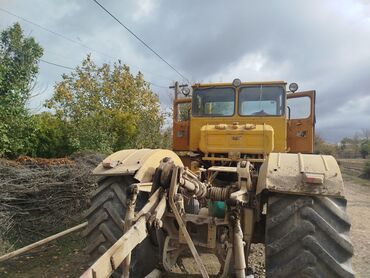 Mitsubishi: Ağır sinif dördoxlu traktor və qoşma kotan dəsti Texnika: - Güclü