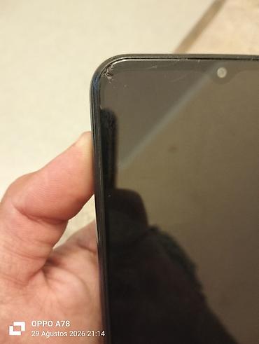 micro qulaq: Samsung Galaxy M14 5G, 128 GB, rəng - Qara, Qırıq — 5