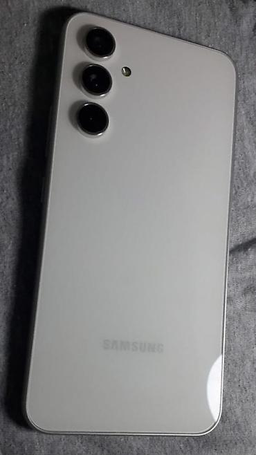 galaxy s10 e: Samsung Galaxy S23, 256 GB, rəng - Bej, Düyməli, Sensor, Barmaq izi — 3