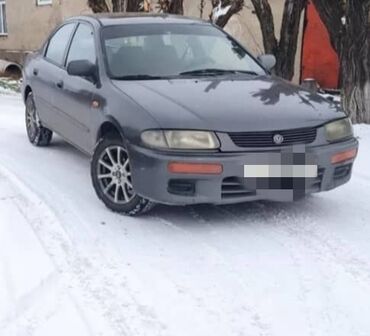 киргизские машины: Mazda 323: 1994 г., 1.5 л, Механика, Бензин, Седан