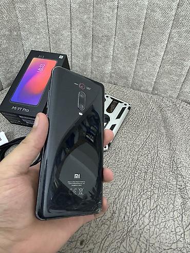 tecno coman 40pro: Xiaomi Mi 9T Pro, 128 GB, rəng - Qara, 
 Barmaq izi, İki sim kartlı, Face ID — 3