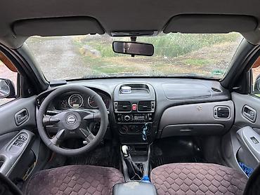 almer: Nissan Almera: 2003 г., 1.5 л, Механика, Бензин, Хэтчбэк — 5