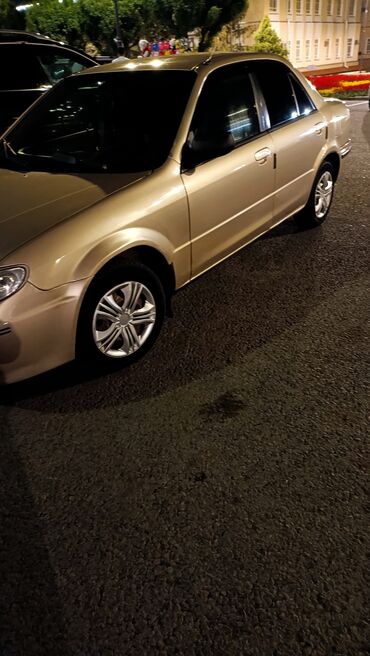 пульт от авто: Mazda Protege: 2001 г., 1 л, Автомат, Бензин, Седан