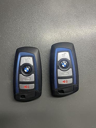 bmw acari: BMW smart açar breloku (3 düyməli panel – kilidləmə, baqaj açma, siqnal/panik), Orijinal, Yeni — 1