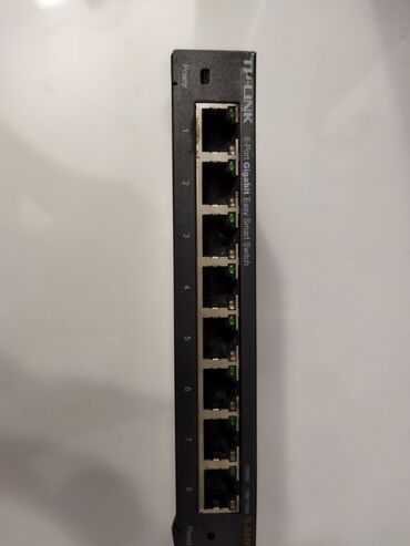 modem router tp link: Tecili Tp Link Smart Swich sivic 8 port Gigabit 4 ayagi poedir