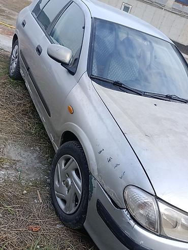 чехлы в авто: Nissan Almera: 2000 г., 1.5 л, Механика, Бензин, Хэтчбэк — 2