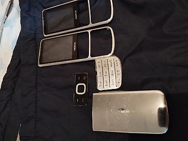 retro telefon: Nokia 6700 Slide, < 2 GB Memory Capacity, rəng - Gümüşü, Düyməli — 8