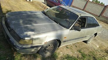 домкраты на авто: Mazda 626: 1992 г., 1.8 л, Механика, Бензин